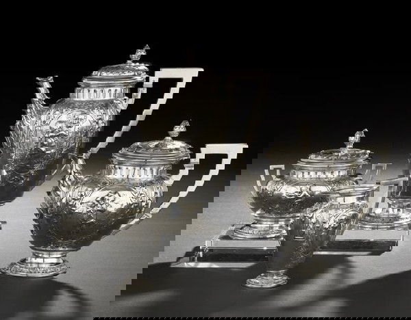 German .800 Silver Coffee and Tea Set: German .800 Silver "Four Seasons" Coffee and Tea Set, first quarter 20th century, by J. D. Schleissner Sohne, Hanau, in the Historismus style, including a coffeepot, h. 10-1/4", a teapot, h. 7-3/4", a