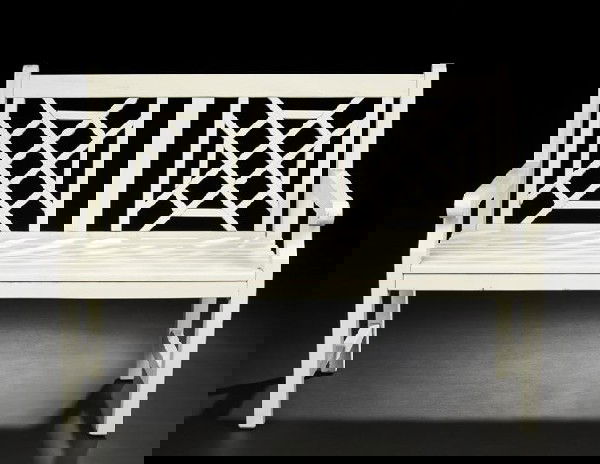 Contemporary Painted Wooden Garden Bench: Contemporary Painted Wooden Garden Bench, the rectangular back with two splats, each with pierced designs in the Chinese Chippendale taste, joined by flat arms to the slatted seat, raised on square le