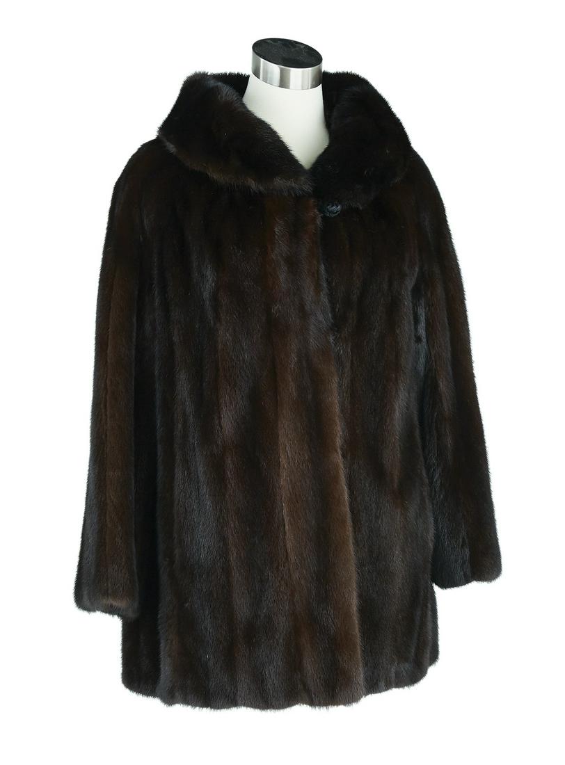 Chic Donald Brooks Chocolate Brown Mink Jacket: Chic Donald Brooks Chocolate Brown Mink Jacket size 8, with a silk-inset button at the portrait collar and two front hook closures, straight raglan sleeves and on-seam pockets below a 1-1/2" opening t