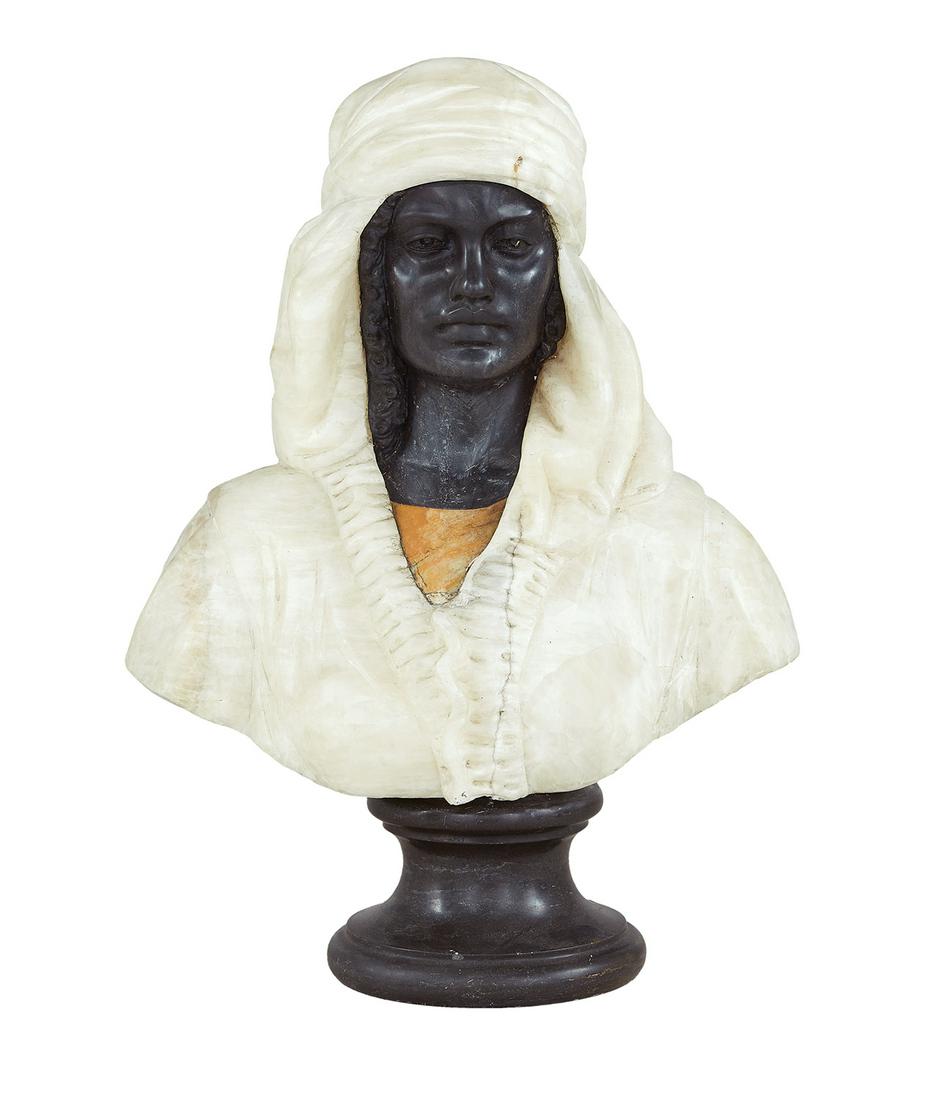 Italian Bust of a Bedouin Woman: Italian Carved Marble and Alabaster Bust of a Bedouin Woman 19th century, on a socle base. sculpture h. 21", w. 22", d. 8-1/2" Provenance: The Collection of Adam Lippes. Literature: Mitchell Owens, "I