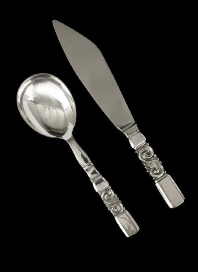 Two Georg Jensen "Scroll"-Pattern Serving Pieces: Two Georg Jensen Sterling Silver "Scroll"-Pattern Serving Pieces, the pattern designed in 1927 by Johan Rohde (1856-1935), with the post-1945 Jensen mark, including a serving spoon, l. 8-3/8", and a c