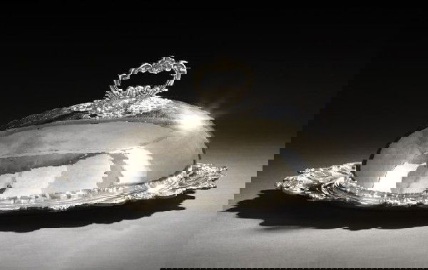 Large Italian Silver Meat Platter and Dome: Large Italian Silver Meat Platter and Dome, third quarter 20th century, by Mario Buccellati (1891-1965), Milan, retailed in New York, unmarked but probably .800 silver, the platter of oval form with a