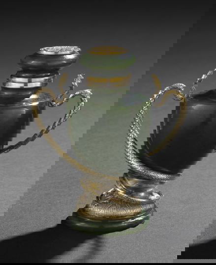 Fauxberge Silver-Gilt-Mounted Jade Cabinet Urn: "Fauxberge" Silver-Gilt-Mounted Jade Cabinet Urn, late 20th century, the carved spinach jade urn with silver-gilt snake-handled mount, the cap set with a medallion of the Imperial arms surrounded by s