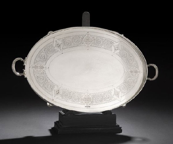 Edwardian Sterling Silver Tray: Edwardian Sterling Silver Tray, hallmarked Sheffield, 1903-1904, by Walker & Hall, of oval form, with a pierced gallery and opposing gadrooned handles, the plateau engraved with a wide foliate scroll 
