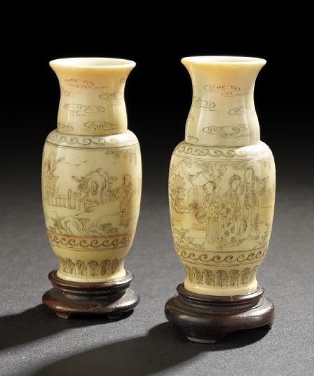 Pair of Chinese Miniature Ivory Vases on Stands: Pair of Chinese Miniature Ivory Vases on Stands, each of baluster shape with flared lip rims, with etched and stained decoration, the central panels with scenes of ladies and attendants in gardens, th