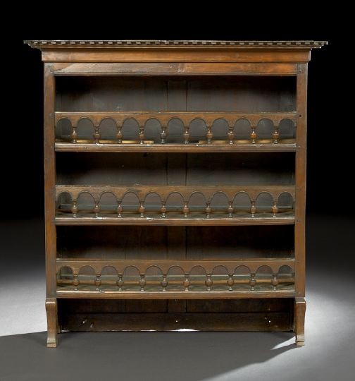 French Provincial Fruitwood Rack: French Provincial Fruitwood Rack, third quarter 19th century, the rounded and dentillated cornice above three shelves, all fronted by a spindled arched gallery, raised on shaped feet, h. 49-1/4", w. 4