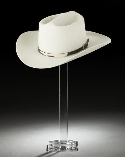 Byer-Rolnick "Resistol" Western Hat: Byer-Rolnick "Resistol" Western Hat, ca. 1970, designed by Harry Rolnick, Garland, Texas, in buff felt with one-quarter-inch brown and white spotted cowhide band with buckle, the red satin crown linin