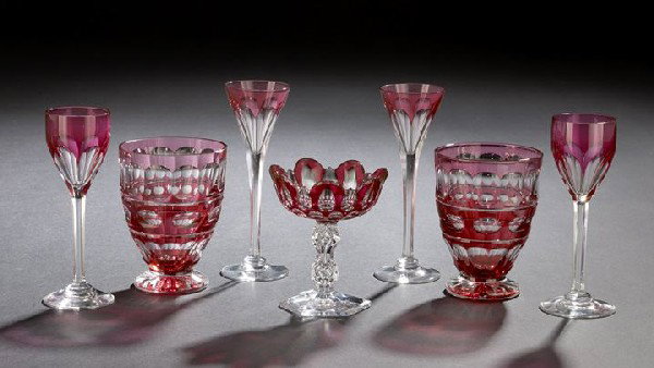 Seven Pieces of Cut Cranberry Overlay Glass: Interesting Seven-Piece Collection of Cut Cranberry Overlay Glass, comprised of a diminutive Val St. Lambert sweetmeat stand with waisted panel-cut air-trap stem, numbered in diamond stylus script, h.