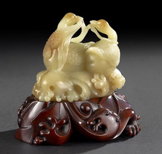 Rare Chinese Yellow Nephrite Jade Group: Rare Chinese Yellow Nephrite Jade Group, 18th/19th century, carved in the round as a pair of geese contending over a spray of millet, each with delicately incised details to the feathers and the grain