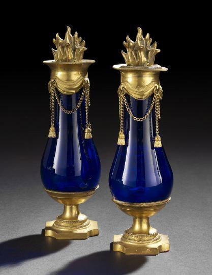 Pair of Napoleon III Cobalt Glass Garniture Vases: Good Pair of Napoleon III Gilt-Brass-Mounted Cobalt Glass Garniture Vases, third quarter 19th century, in the Louis XVI style, of baluster form, the gilt-brass collars with draped and tassellated gilt