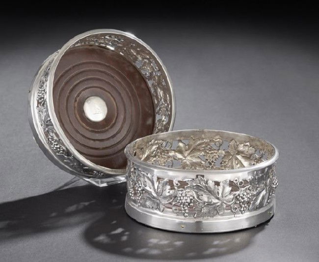 Pair of Sterling Silver Wine Coasters: Pair of William IV/Victorian Sterling Silver Wine Coasters, hallmarked Sheffield, 1832-33 and 1839-40, by Battie, Howard & Hawksworth, each of squat cylindrical form, decorated with well-detailed pier