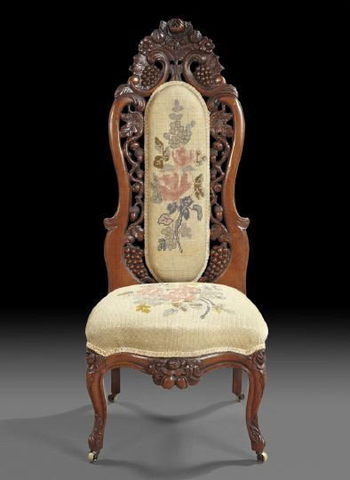 American Rococo Revival Rosewood Slipper Chair: American Rococo Revival Laminated Rosewood Slipper Chair, third quarter 19th century, attributed to J. H. Belter, New York, the back with a fruit- and floral-carved crest over a narrow ovoid backrest 