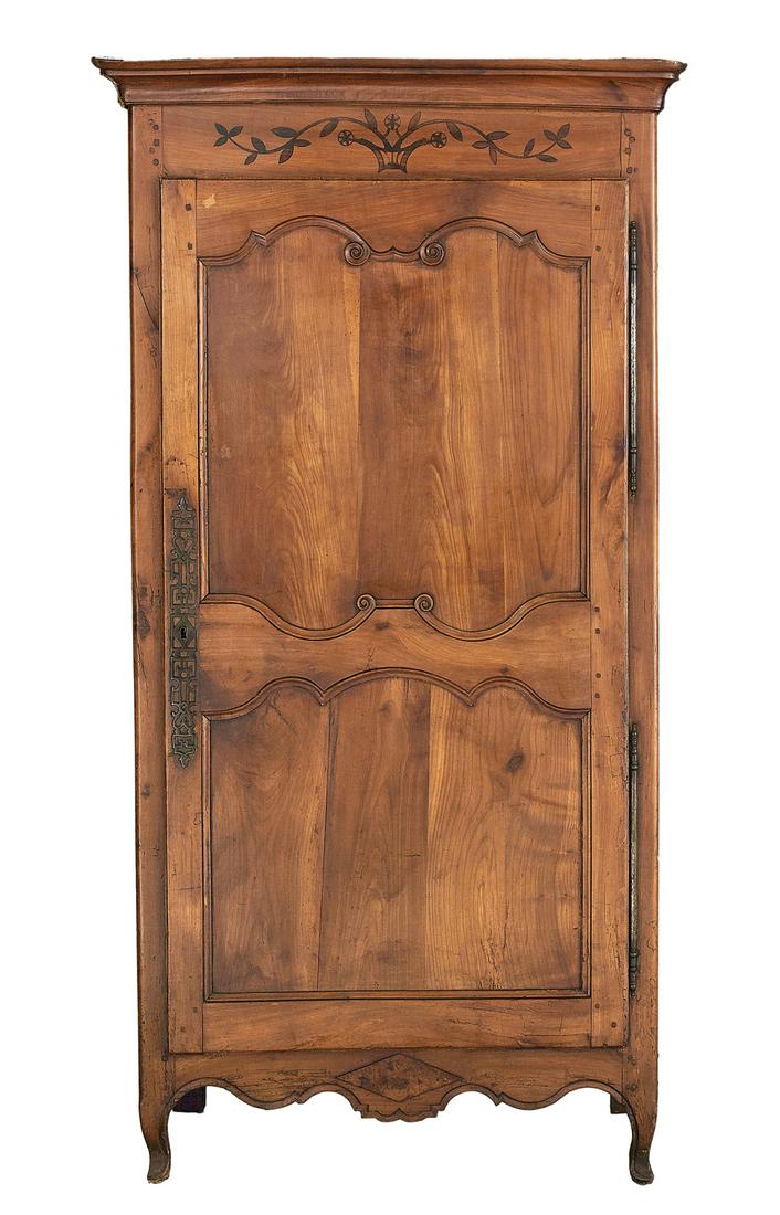 Provincial Louis XV Fruitwood Bonnetiere: Provincial Louis XV Fruitwood Bonnetiere 19th century, the molded cornice over a frieze with an inlaid vase, flora and vines, above a bisected door with shaped panels, scalloped apron and cabriole leg