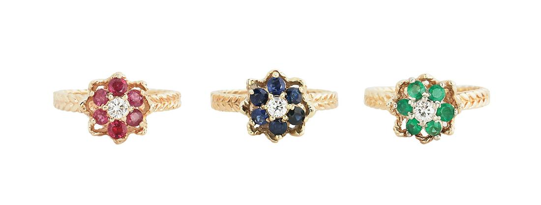 Three Gem-Set Stackable Rings: Three Gem-Set Stackable Rings 14k yellow gold, the rings in the form of flowers and made to be worn alone or stacked together, each mounted with round brilliant-cut diamonds weighing approximately 0.3