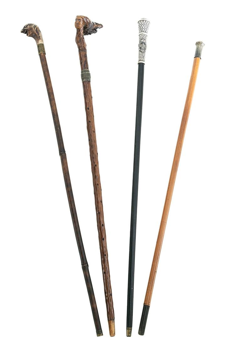 Four Sword and "Gadget" Walking Sticks: Four Continental Sword and "Gadget" Walking Sticks late 19th/early 20th century, including: a Continental walking stick with figural carved bone pommel handle, in the form of a grinning man and drawin