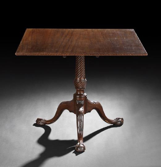 George III-Style Mahogany Tripod Table: George III-Style Mahogany Tripod Table, late 19th century, the tilting square top with a carved floral guilloche edge, raised on a spiral-fluted urn-form standard to three splayed legs headed by folia