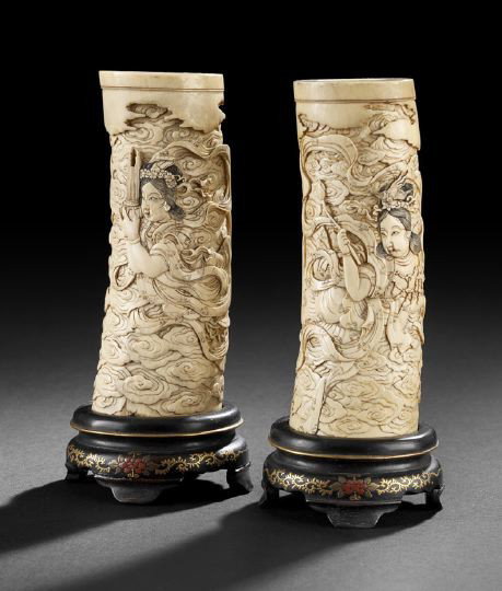 Chinese Carved Ivory Sections of Elephant Tusks: Chinese Well-Carved Ivory Sections of Elephant Tusks, 19th century, each of slightly curved form, carved in low relief with intricate detail depicting female deities, one holding a lotus, the other ho