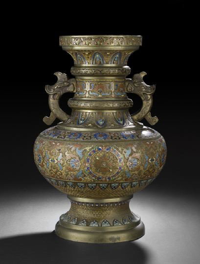 Large Chinese Champleve Bronze Vase: Large Chinese Champleve Bronze Vase, 19th century, of expanded baluster form with dragon handles and flared lip rim, the body with cast archaic decoration and champleve enamel highlights of lotus blos