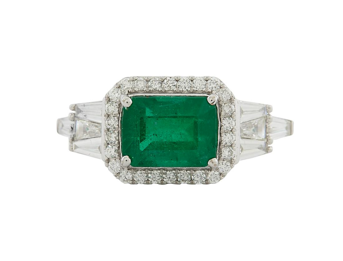 Emerald and Diamond Ring: Emerald and Diamond Ring 18k white gold, the ring mounted with an emerald-cut treated emerald weighing approximately 1.40 carats, accented by round brilliant-cut and baguette-cut diamonds weighing app