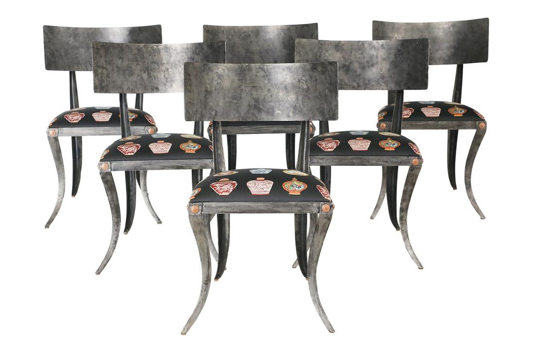 Six Ched Berenguer-Topacio Klismos Chairs: Suite of Six Ched Berenguer-Topacio Klismos Chairs late 20th century, Philippines, each executed in patinated wrought iron, with a curved tablet back and brass rosettes at the top of dramatically flar