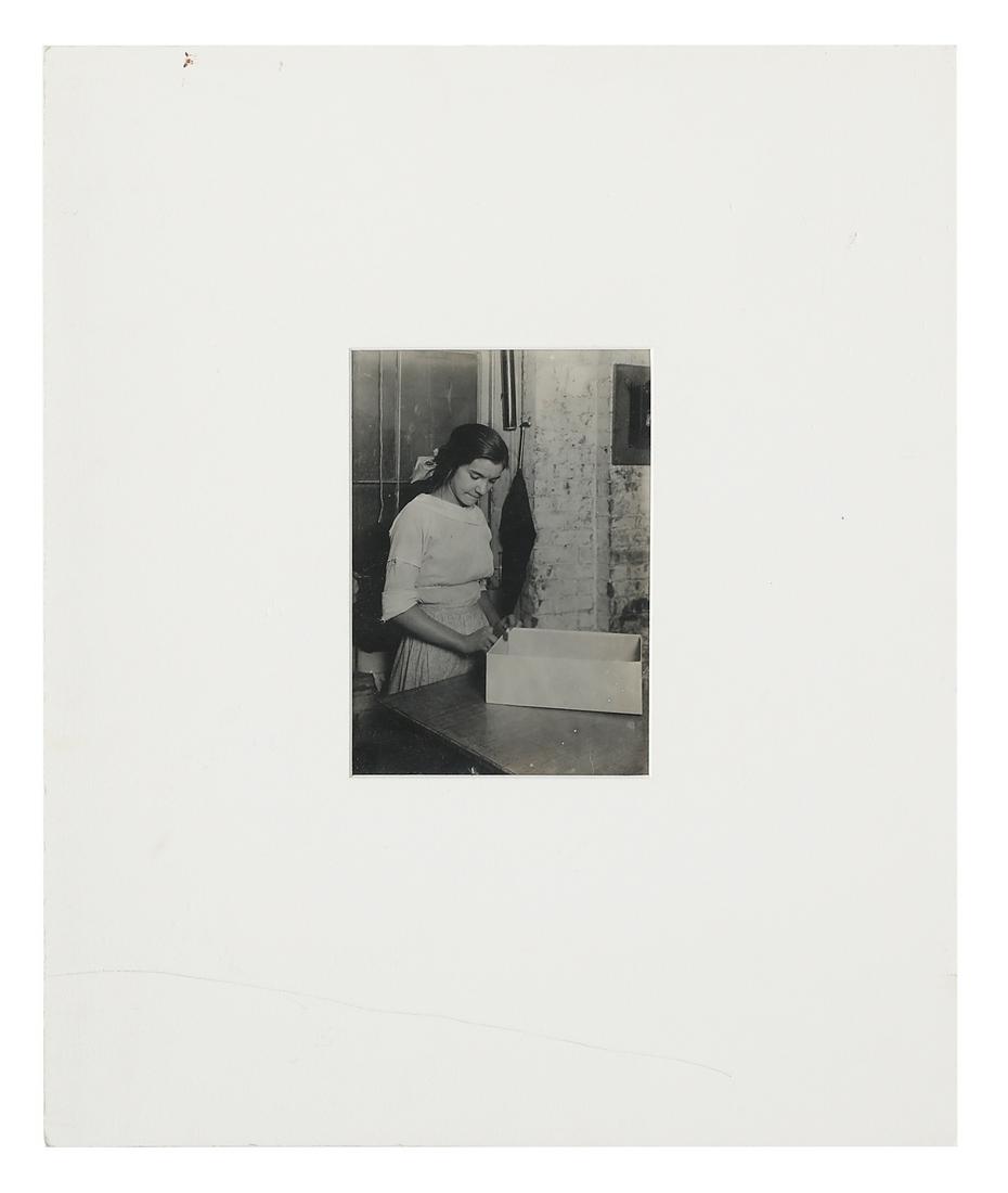 Lewis Wickes Hine, (American, 1874-1940): Lewis Wickes Hine (American, 1874-1940) "Paper Box Factory, Turning, Indiana" gelatin silver print pencil-inscribed "H3483" at back, in a protective mat. Unframed. sheet 7" x 5", mat 17" x 14"