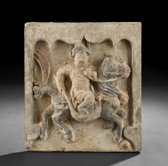 Chinese Molded and Painted Pottery Wall Tile: Chinese Molded and Painted Pottery Wall Tile, Song Dynasty (960-1279), of nearly square form molded in relief as a mounted calvaryman with a whip atop a prancing steed, red and black painted details, 
