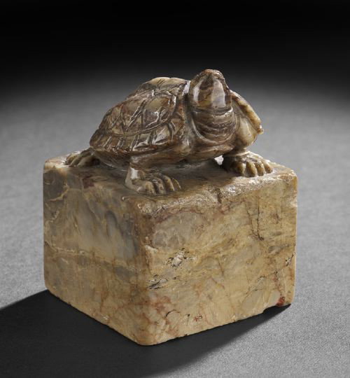 Chinese Inscribed Soapstone Personal Seal: Chinese Inscribed Soapstone Personal Seal, the square base topped with the figure of a tortoise with etched carapase, the base with seal characters and remnants of red seal paste, w. 2-1/4", l. 2-1/4"