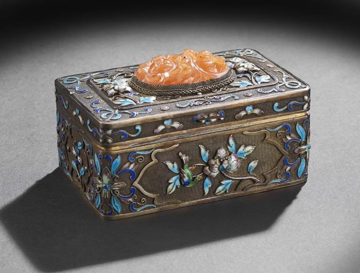 Chinese Export Silver, Enamel and Carnelian Box: Chinese Export Silver, Enamel and Carnelian Box, first half 20th century, the rectangular hinge lidded box with enameled, raised floral decoration, the top set with an oval carved carnelian cabochon, 