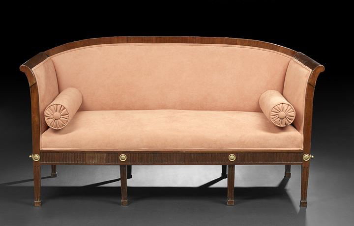 Good Louis XVI Mahogany Settee: Good Louis XVI Mahogany Settee, fourth quarter 18th century and later, the padded, slightly domed back and outscrolled arms joined to the padded seat, raised above the reeded ormolu-applied apron on f