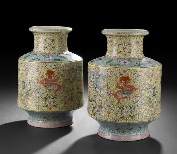 Pair of Chinese Famille Jaune Altar Vases: Decorative Pair of Chinese Famille Jaune Altar Vases, 20th century, each of barrel form with indented bases and flared necks, decorated with fine clawed dragons among flowers and Buddhist symbols on t