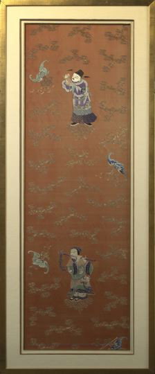 Two Framed Chinese Embroidered Silk Panels: Two Framed Chinese Embroidered Silk Panels, ca. 1860, both with red silk ground embroidered in gold and silver threads with clouds and in colored silk with bats carrying Buddhist symbols, the two immo