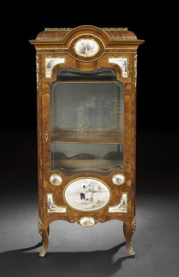 Transitional Walnut and Burl Wood Display Case: Transitional Louis XV-into-Louis XVI Walnut and Burl Wood Display Case, mid-20th century, the ogee-molded cornice with a pierced brass gallery, above a frieze centered by a porcelain plaque, over a do