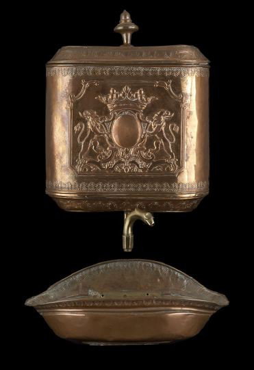 Continental Embossed-Copper Lavabo: Continental Embossed-Copper Lavabo, late 19th century, the lidded tank with an embossed central panel with a crowned oval cartouche with and lion supporters above a brass spigot, the bowl below with a