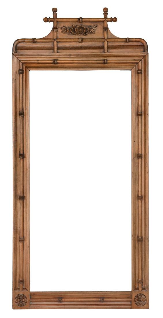 American Fruitwood Pier Mirror: American Fruitwood Pier Mirror in the Aesthetic Taste fourth quarter 19th century, with a bamboo-turned surround and bull's-eye turnings in the lower corners, the crest decorated with carved flowers f