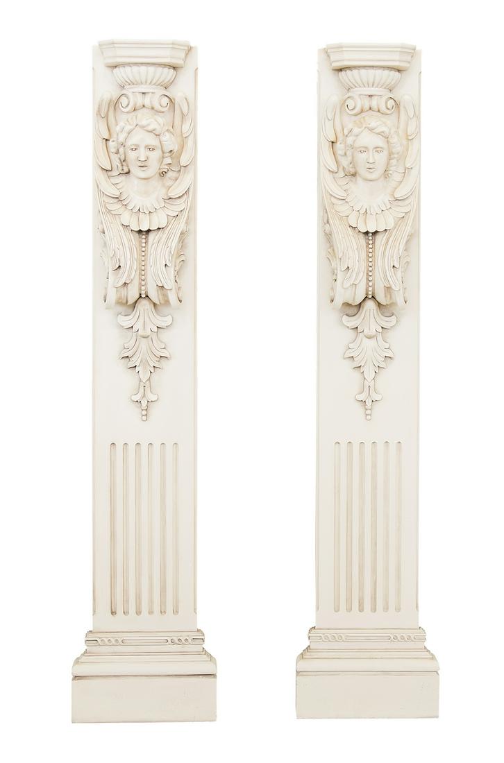 Pair of Carved Wooden Caryatid Pilasters: Pair of Carved Wooden Caryatid Pilasters in the neoclassical taste, each of an allegorical female masque bracket beneath a ribbed urn-form capital, with fluting below. h. 78", w. 17", d. 6-3/4"