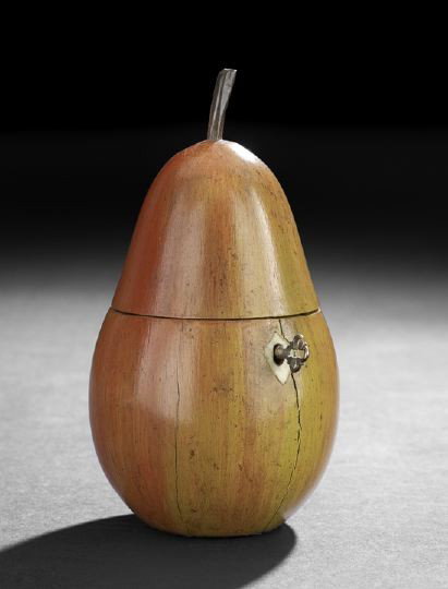 George III-Style Polychrome Fruitwood Tea Caddy,: George III-Style Polychrome Fruitwood Tea Caddy, in the form of a pear, with shield-form bone escutcheon, realistically painted, the interior paktong-lined, h. 7".