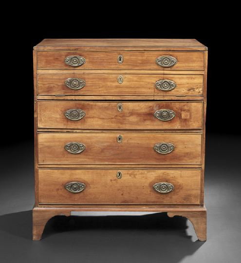 George III Fruitwood Butler's Chest,: George III Fruitwood Butler's Chest, early 19th century, the rectangular top above a conforming case fitted with a drop-front secretary drawer fitted with a variety of drawers and cubbyholes over thre