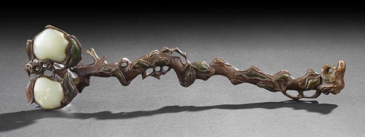 Unusual Chinese Bronze and Jade Ruyi Scepter,: Unusual Chinese Bronze and Jade Ruyi Scepter, 19th century, skillfully cast as a gnarled branch with leaves, eleven inlaid with dark green jade, the head cast as two peaches, each inlaid with a celado