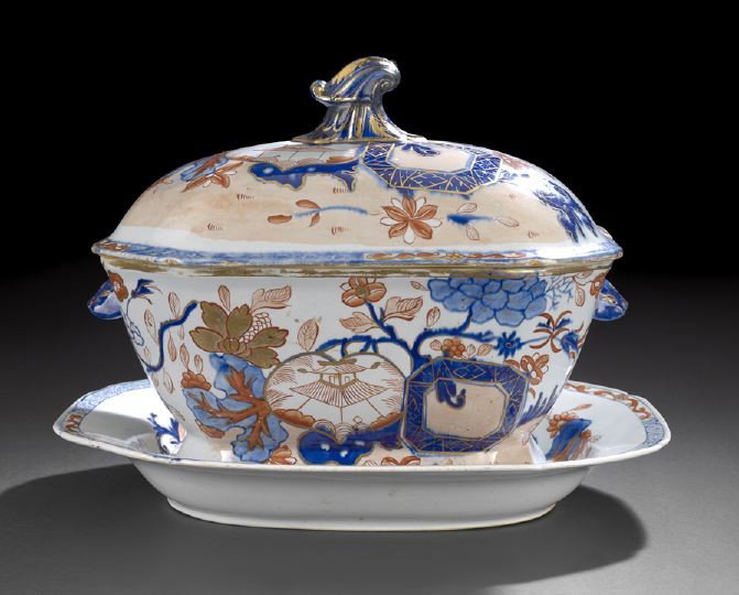 Chinese Ironstone Covered Tureen and Stand,: Chinese Ironstone Covered Tureen and Stand, 20th century, of 18th century export form, decorated in Chinese Imari colors of underglaze blue, iron-red and gilding with an overall floral motif, w. 11-1/