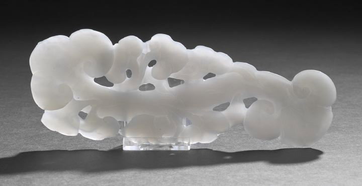 Chinese Carved Gray Agate Ruyi Plaque,: Chinese Carved Gray Agate Ruyi Plaque, second half 19th century, the flattened carved gray agate depicting a double-headed ruyi scepter with ling chih heads at each end and smaller ling chih heads alo