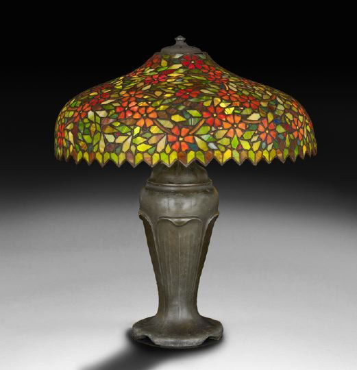 Handel Stained and Leaded Glass Table Lamp: Fine Handel Stained and Leaded Glass Table Lamp in the Apple Blossom Pattern, early 20th century, the shade bearing the Handel tab soldered near the inner, upper rim, the base with an impressed Handel