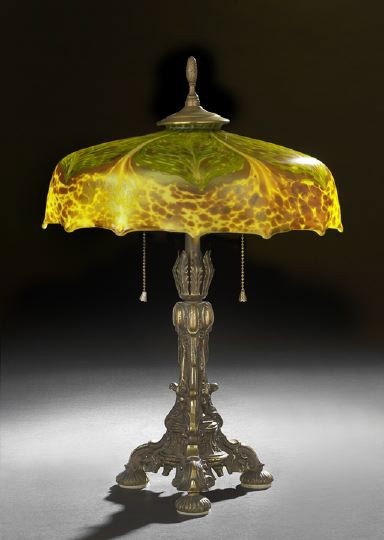 Steuben Pulled Feather and Tortoise Glass Lamp: Rare Steuben Pulled Feather and Tortoise Glass Table Lamp, early 20th century, probably designed as a hanging shade and now fitted to a cast-brass lamp base, the inside lip of the shade signed, h. 21"