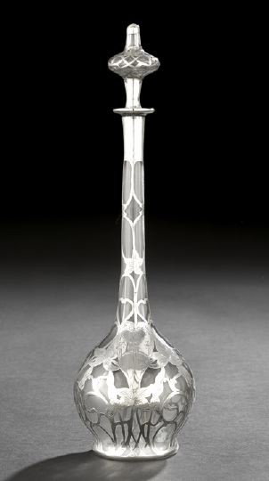 Alvin Silver Overlay Glass Cologne,: Alvin Silver Overlay Glass Cologne, first quarter 20th century, by the Alvin Mfg. Co., Sag Harbor, New York, the ovoid colorless glass body with a very tall, thin neck and flared rim overlaid with pur