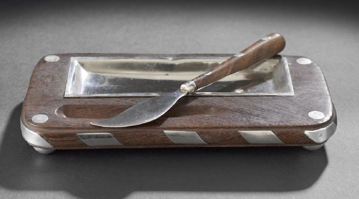 Mexican Sterling and Ebony Butter Knife and Tray: Mexican Sterling Silver and Ebony Butter Knife and Tray, third quarter 20th century, Taxco, in the manner of William Spratling (1900-1967), of rounded rectangular form, the torus molded edge of the tr