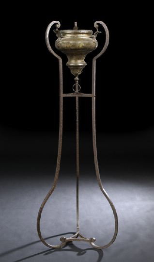 Italian Provincial Wrought-Iron and Brass Brazier: Italian Provincial Wrought-Iron and Brass Brazier, early 20th century, in the neoclassical taste, the brazier suspended by three scrolling wrought-iron supports, h. 65-3/4", dia. 21".