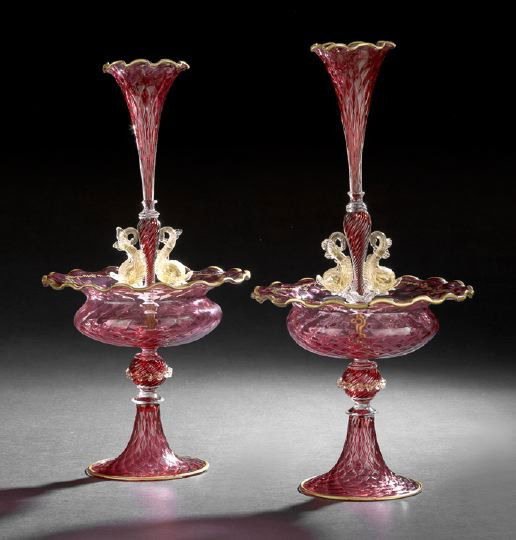 Pair of Venetian Cranberry Glass Epergnes: Pair of Venetian Diamond-Quilted Cranberry Glass Epergnes , first quarter 20th century, each with trumpet-shaped bases topped with a ruffled-edge ball, al gilt ruffled rim with an engraved and gilded