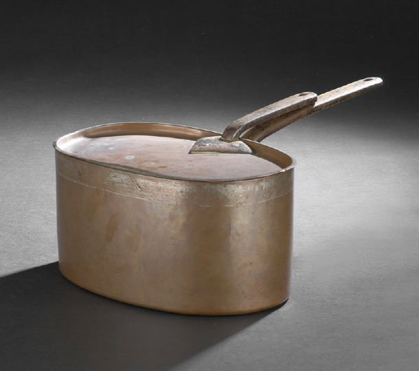 Oval Copper Sauce Pot,: Oval Copper Sauce Pot, fourth quarter 19th century, mode of dovetailed construction with an iron handle on both the pot and the conforming lid, each with worn tin lining, h. 8", w. 14", d. 22".