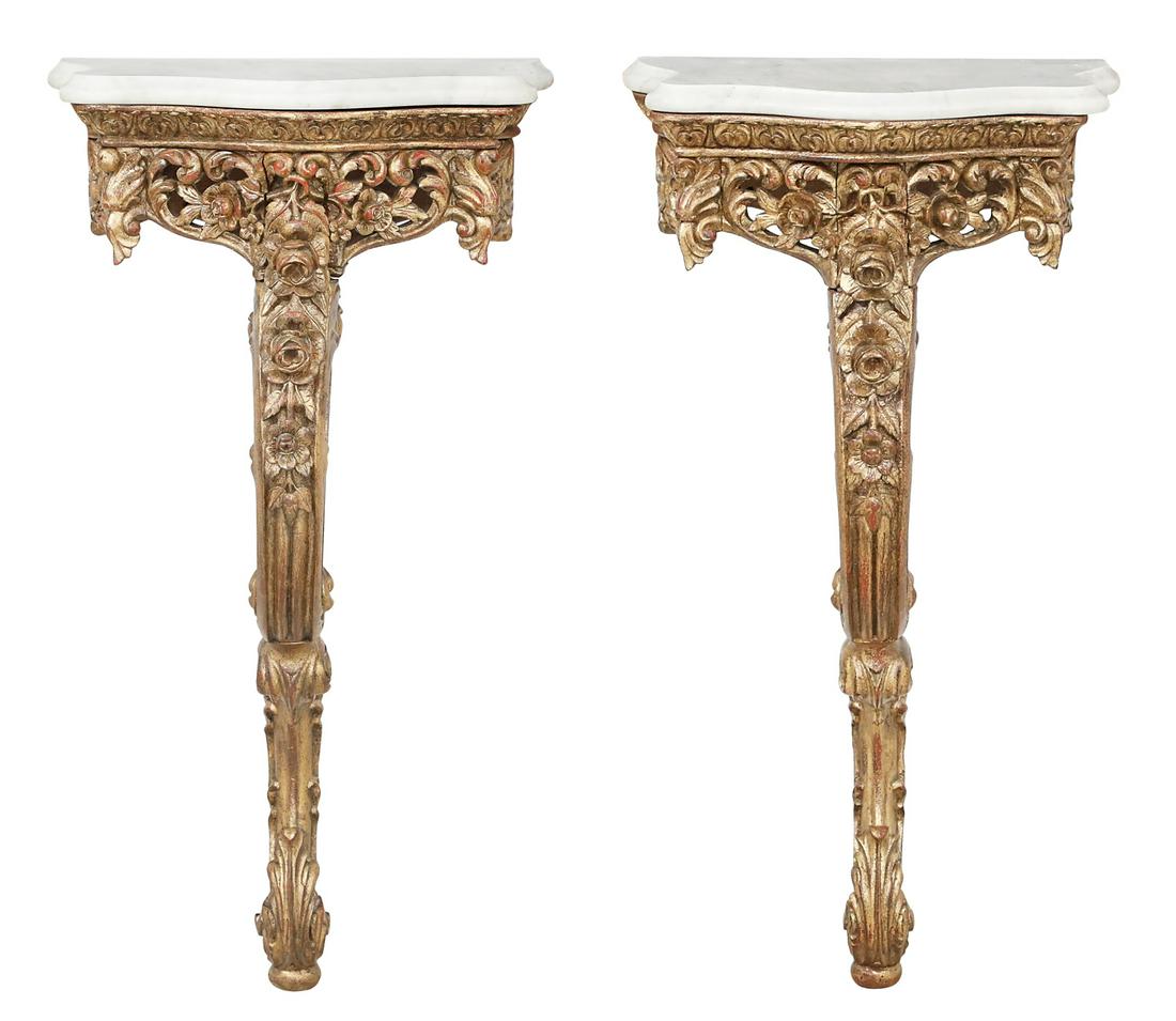 Pair of Louis XV-Style Marble-Top Consoles: Pair of Louis XV-Style Giltwood and Marble-Top Consoles mid-20th century, the serpentine white marble top with a molded edge, above a conforming floral- and foliate-carved apron, raised on cabriole le
