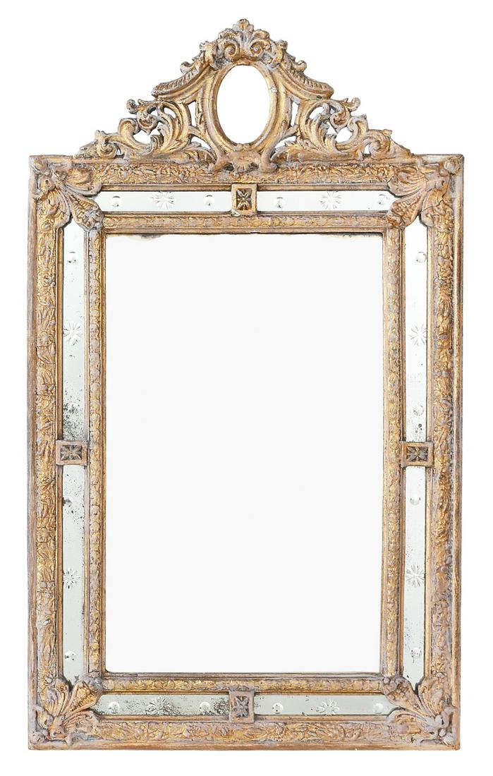 Italian Giltwood Mirror in the Rococo Taste: Unusual Italian Giltwood Mirror in the Rococo Taste fourth quarter 19th century, the side panels reverse cut with flowers and spheres, the crest with an oval frame with pierced scrollwork, the surroun