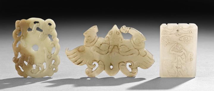 Group of Three Chinese Carved Jade Pieces: Group of Three Chinese Carved Jade Pieces, 19th century, composed of a white jade rectangular plaque with two monkeys, a bi disk in celadon jade surrounded by two hydra dragons and a celadon jade plaq